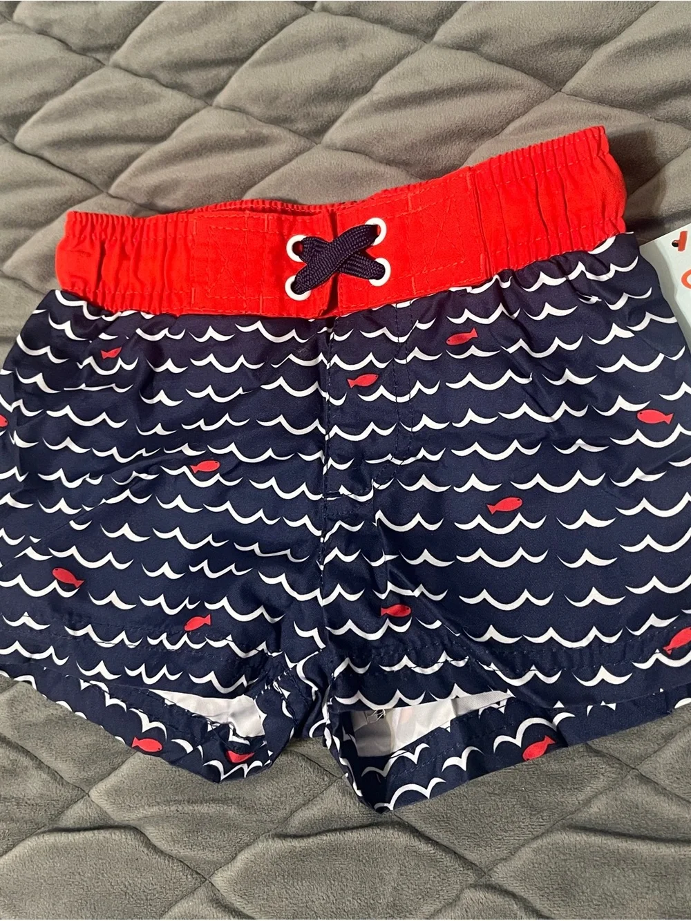 Cat & Jack Boy’s Navy Swim Trunks with Red Waistband and Fish Print